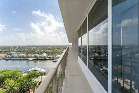 a view of a balcony next to a lake view