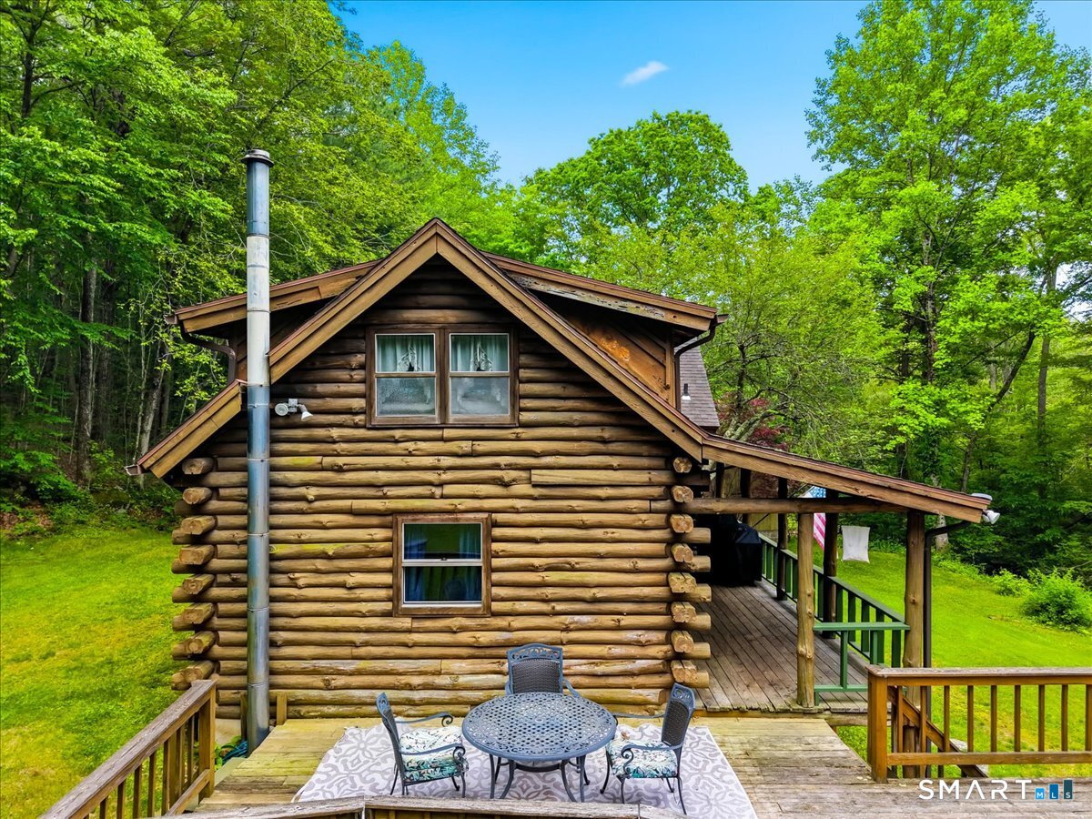 115 Green Hill Road Killingworth, CT 06419 - Photo 6 of 40 Authentic log cabin craftsmanship and character