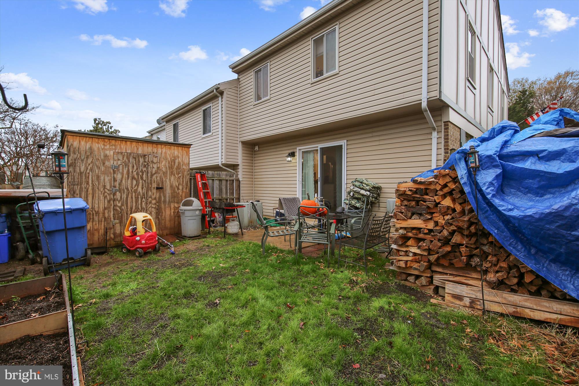 17721 Buehler Road, Unit 13 Olney, MD 20832 - Photo 39 of 42 with shed newly planted grass