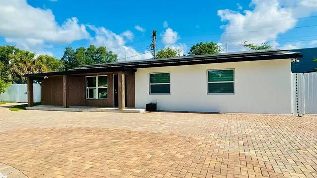 a view of a house with a patio