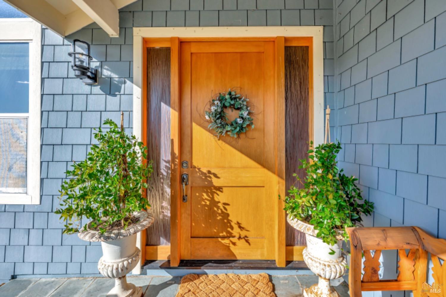 7 Highland Avenue San Rafael, CA 94901 - Photo 1 of 1 a potted plant sitting in front of a door