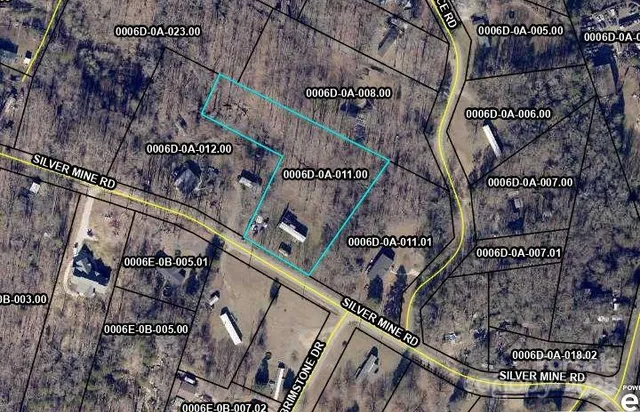 a living room with furniture a air conditioner and a window