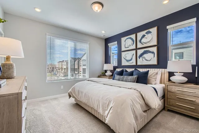 a bed room with a bed and a window