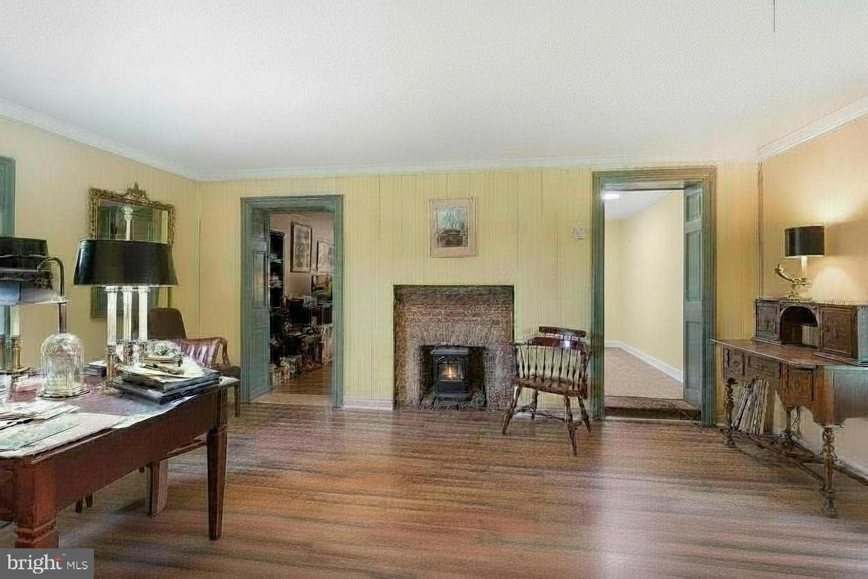 1420 Daisy Road Woodbine, MD 21797 - Photo 25 of 32 Flexible Sitting Room with a Brick Fireplace