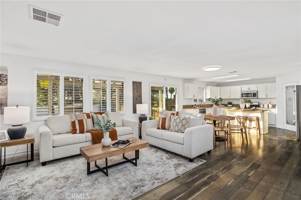 33686 Abbey Road Temecula, CA 92592 - Photo 7 of 37 a living room with furniture and a large window