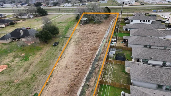 a view of multiple houses with a yard