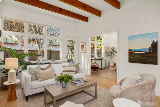 a living room with furniture or couch and a flat screen tv