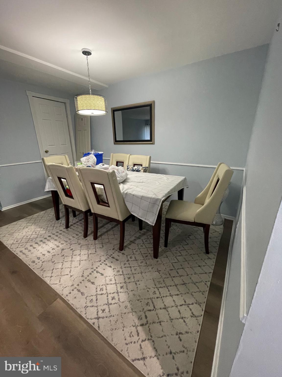 444 Girard Street, Unit 102 Gaithersburg, MD 20877 - Photo 19 of 30 a view of a dining room with furniture