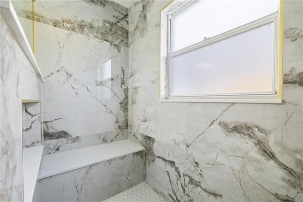 a bathroom with a sink and a bathtub