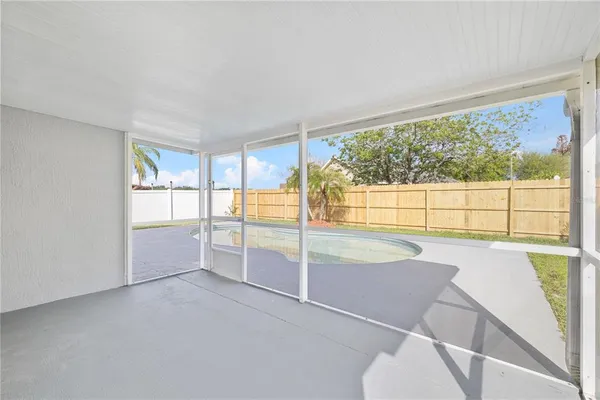 a view of a room with window and an outdoor view