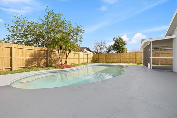 a view of a swimming pool with an outdoor space