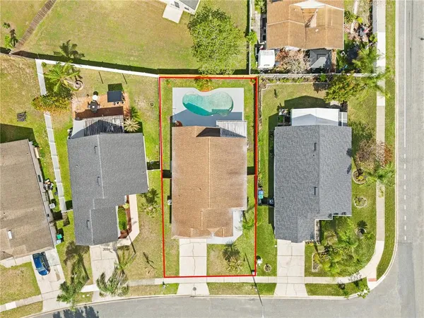 aerial view of a house with outdoor space