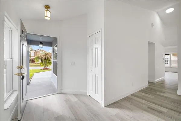 wooden floor in a hall with an entryway