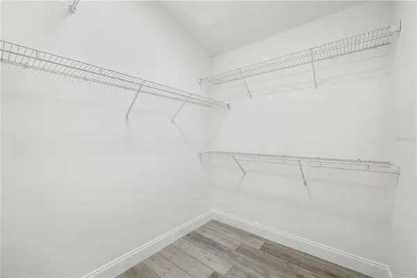 a view of a room with racks on the wall