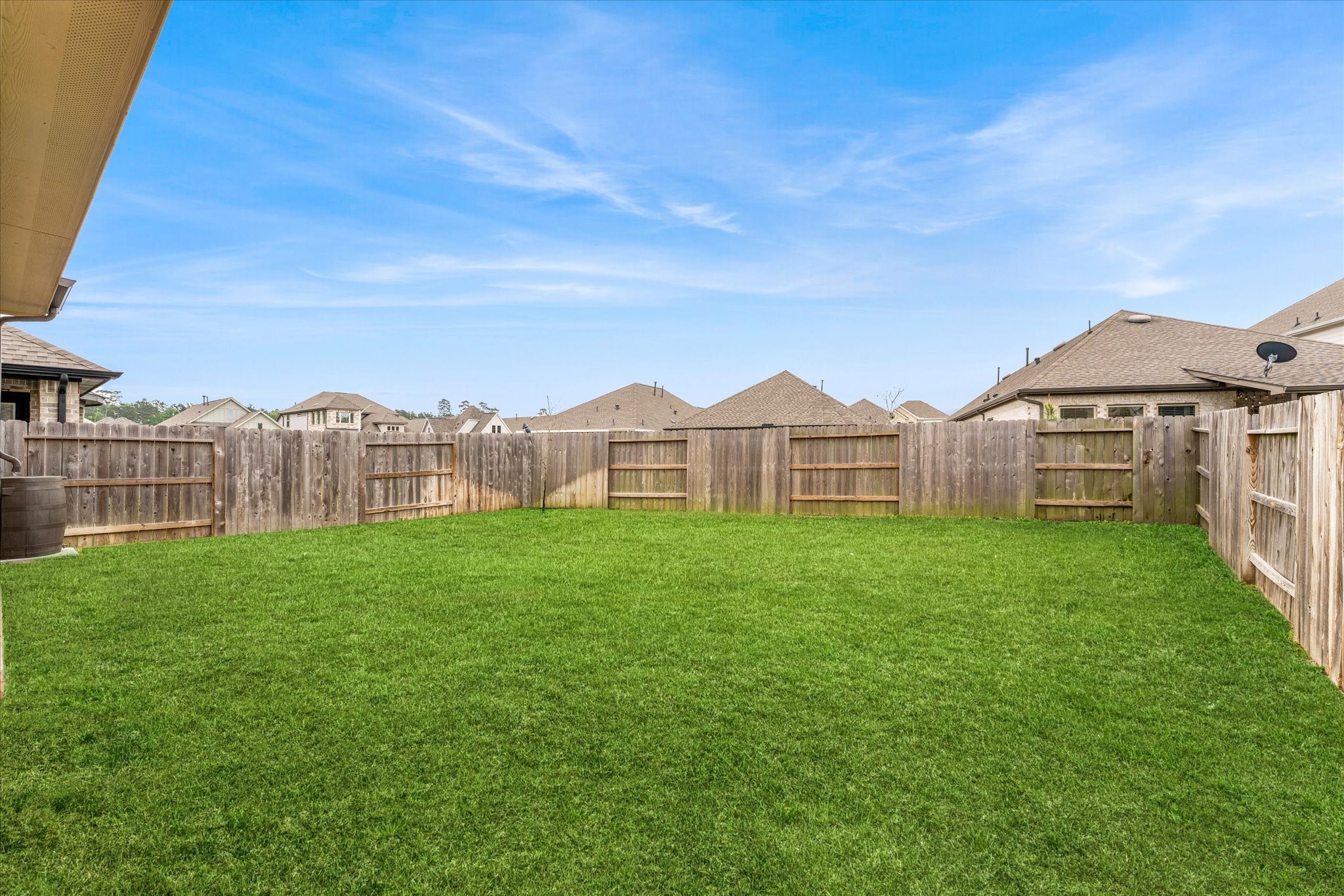 15520 Sunset Maple Court Conroe, TX 77302 - Photo 28 of 46 a view of a house with a yard