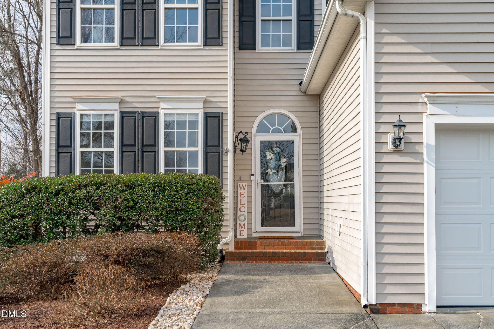 2501 Springfield Park Drive Raleigh, NC 27614 - Photo 3 of 44 a view of a house with entryway and plants