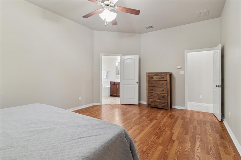 7401 Bishop Pine Road Denton, TX 76208 - Photo 14 of 25 a view of an empty room with a bathroom