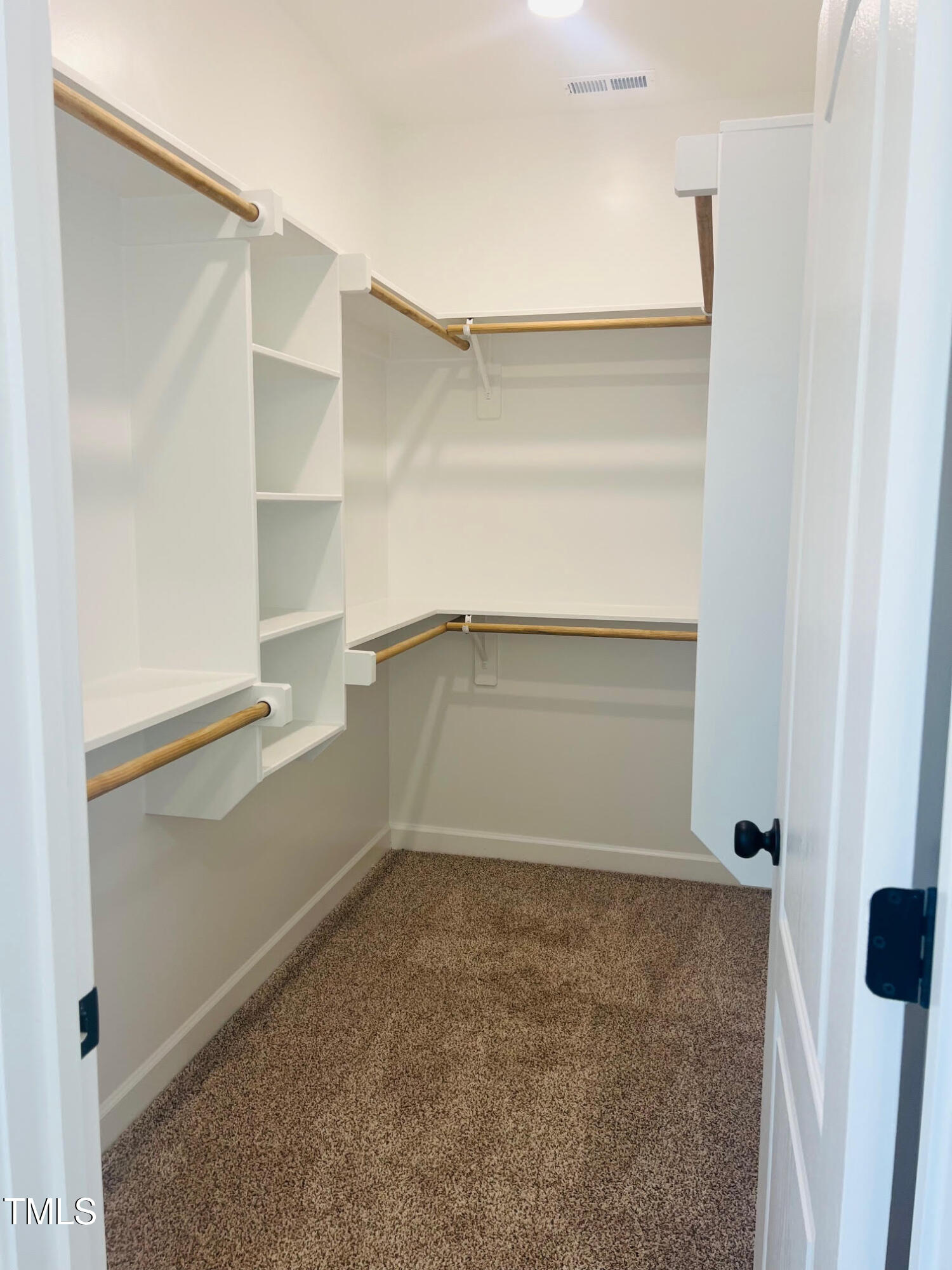 204 Seahawk Way Zebulon, NC 27597 - Photo 4 of 6 Custom Shelving in Owers Suite Closets!