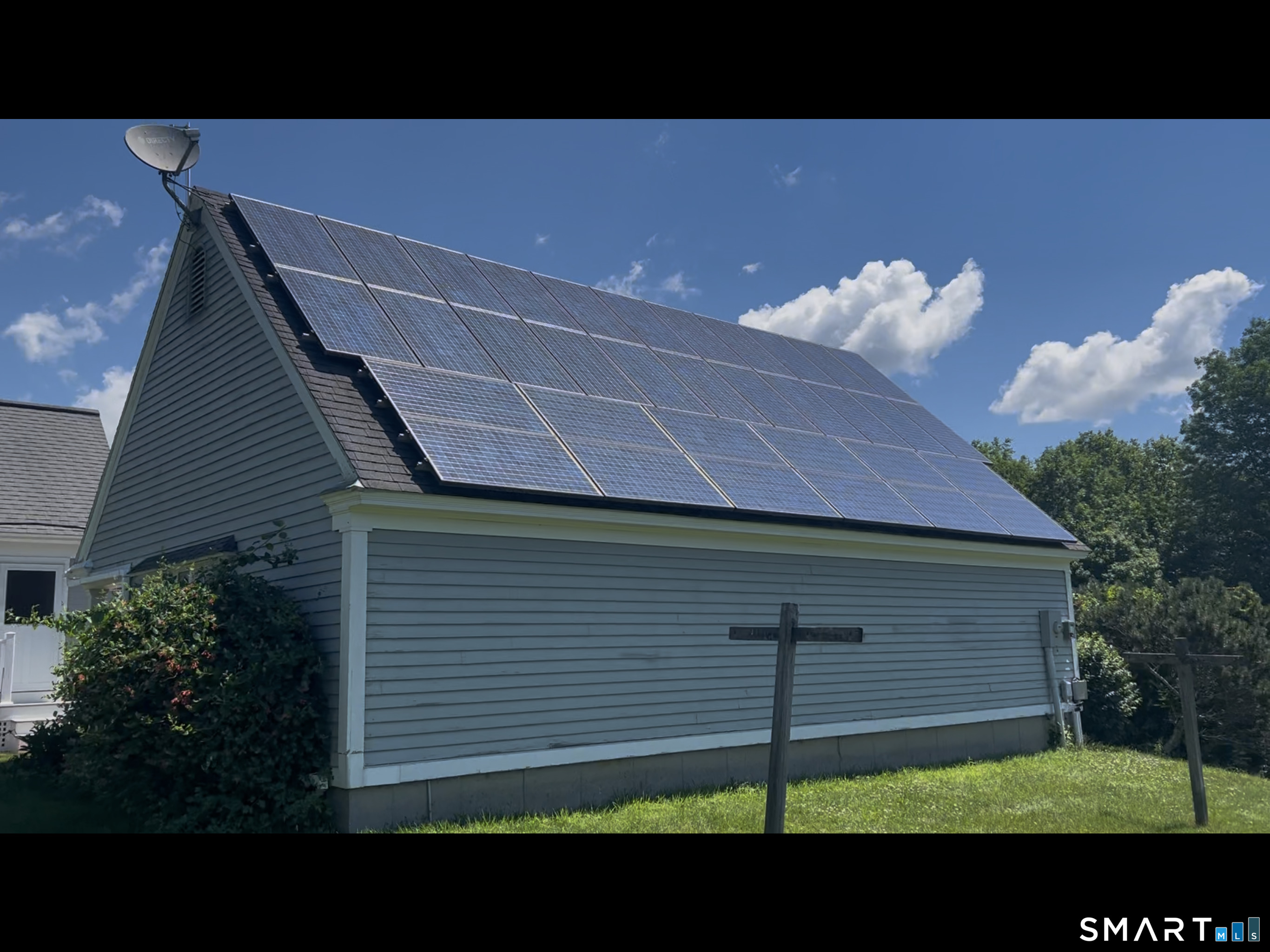 511 Perrin Road Woodstock, CT 06281 - Photo 36 of 40 Fully owned solar on the back of the garage.