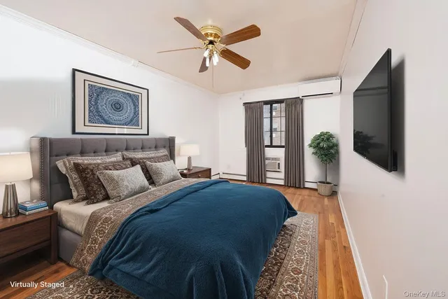 a bed room with a bed and a chandelier