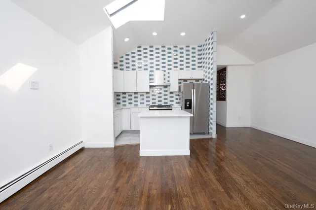 a view of kitchen with wooden floor