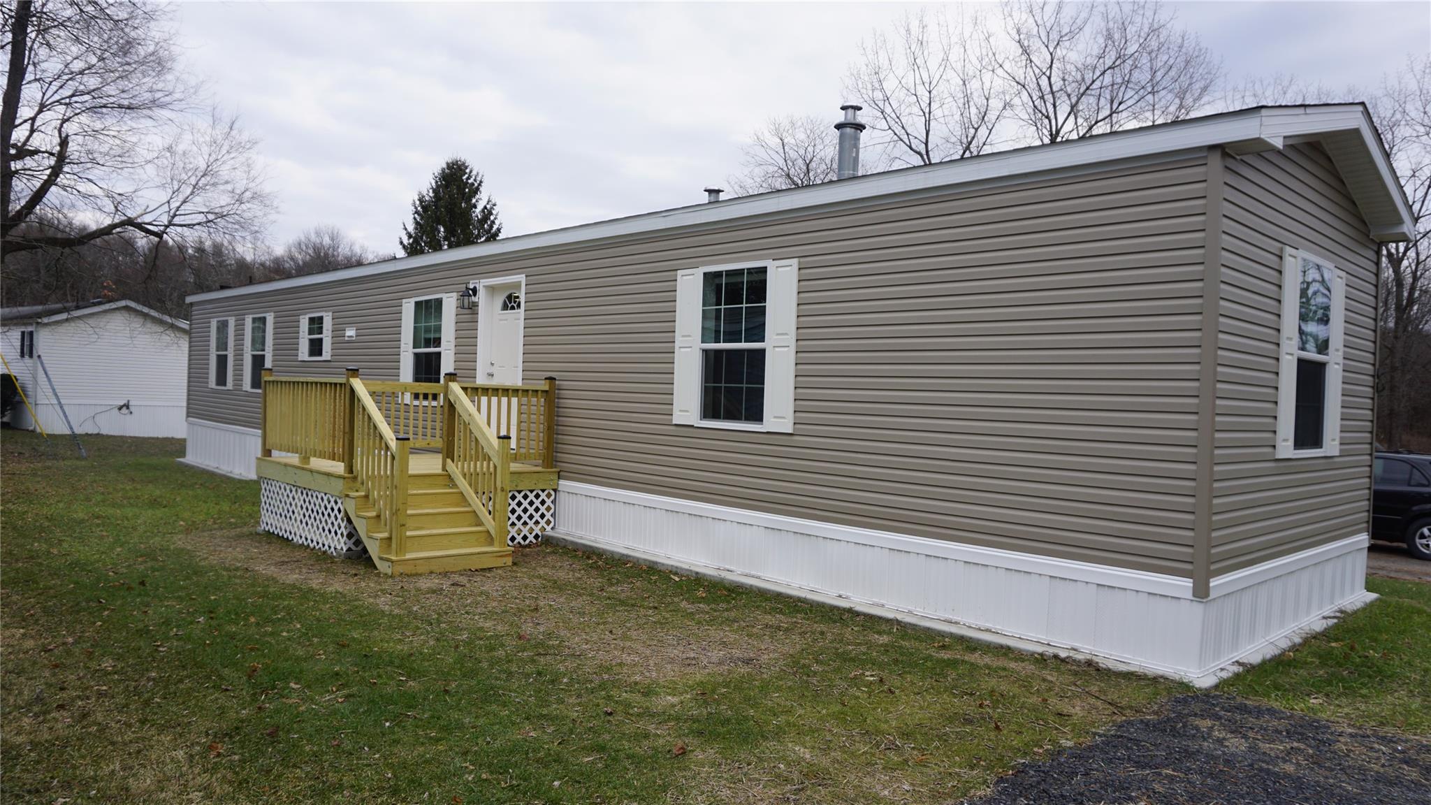155 Metzger Road, Unit 46 Red Hook, NY 12571 - Photo 1 of 1 View of front of property with a front yard