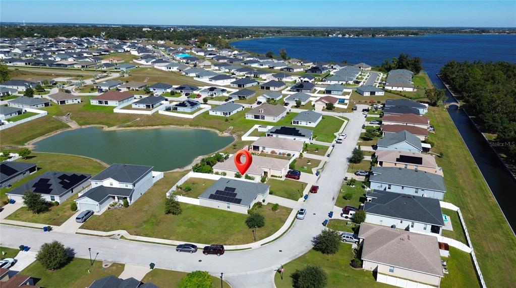 233 Cattail Way Lake Alfred, FL 33850 - Photo 22 of 25 an aerial view of a house with a swimming pool