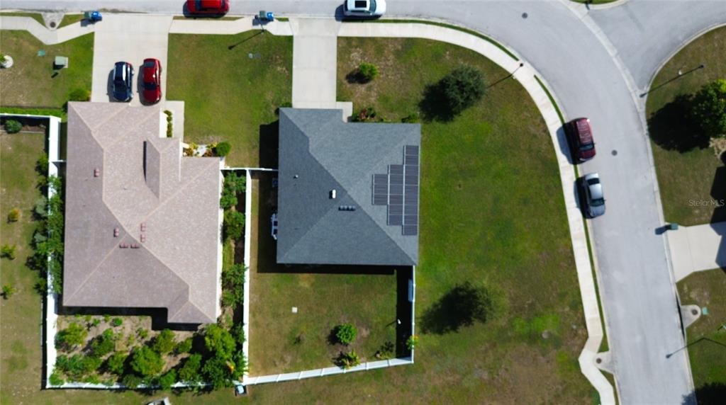 233 Cattail Way Lake Alfred, FL 33850 - Photo 24 of 25 an aerial view of a house with a garden