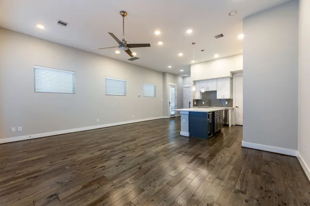 a view of kitchen with wooden floor