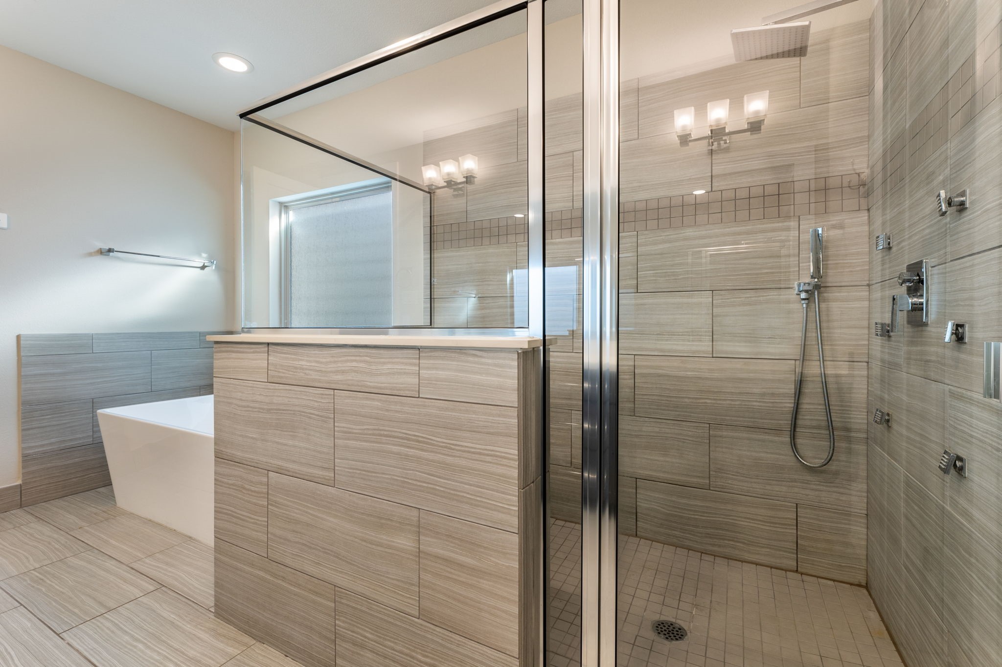 806 Thornton Road, Unit B Houston, TX 77018 - Photo 16 of 28 a bathroom with a shower and a mirror