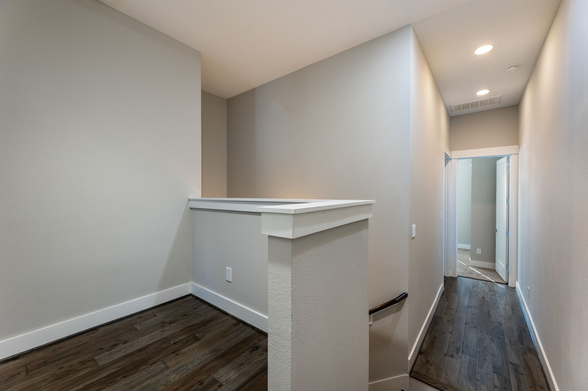 806 Thornton Road, Unit B Houston, TX 77018 - Photo 18 of 28 wooden floor in an empty room with a window