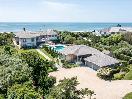 an aerial view of a house with a garden