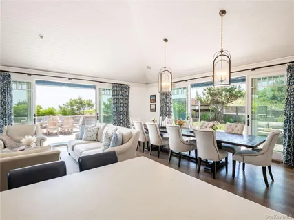 a view of a dining room with furniture window and outside view