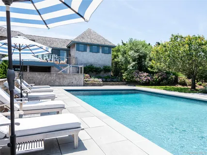 a view of a house with swimming pool