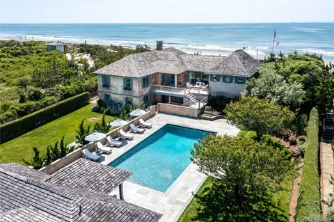 an aerial view of a house with a garden view