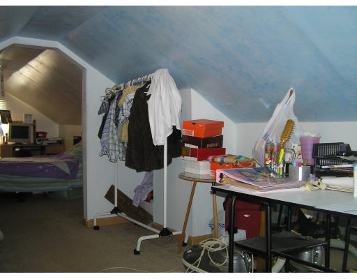 207 Prentice Street Springfield, MA 01104 - Photo 16 of 21 a view of walk in closet with clothes and shoes