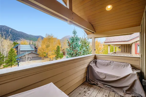 a view of balcony with furniture