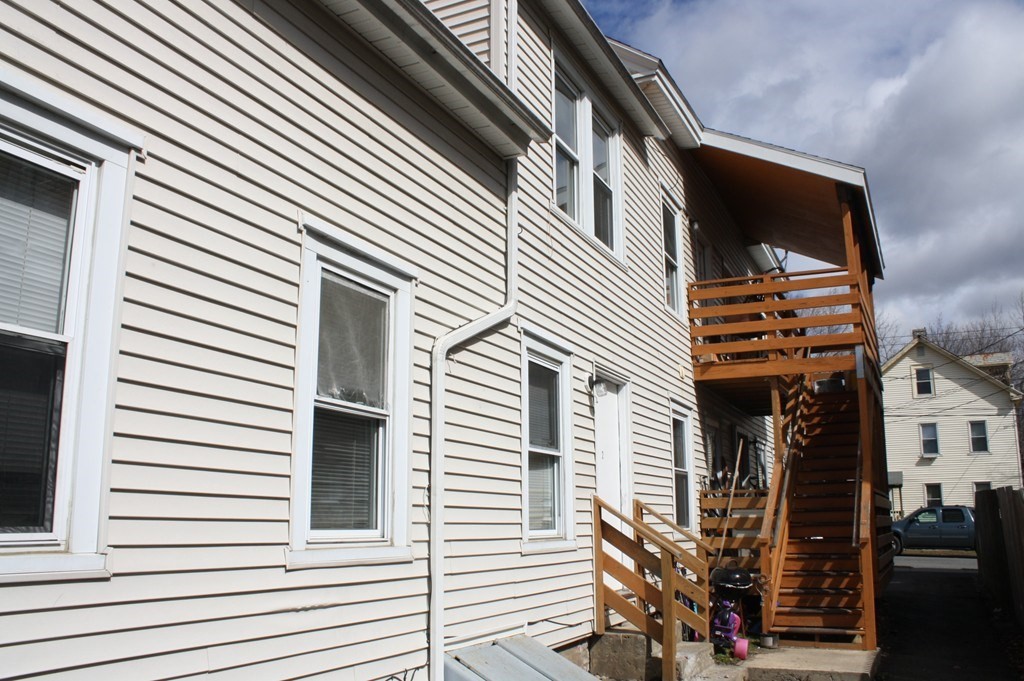76 2nd Street Montague, MA 01376 - Photo 3 of 8 a view of a house with a white door