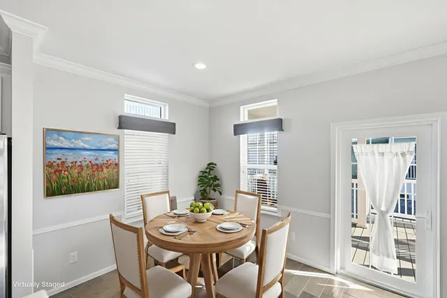 a view of a dining room with furniture