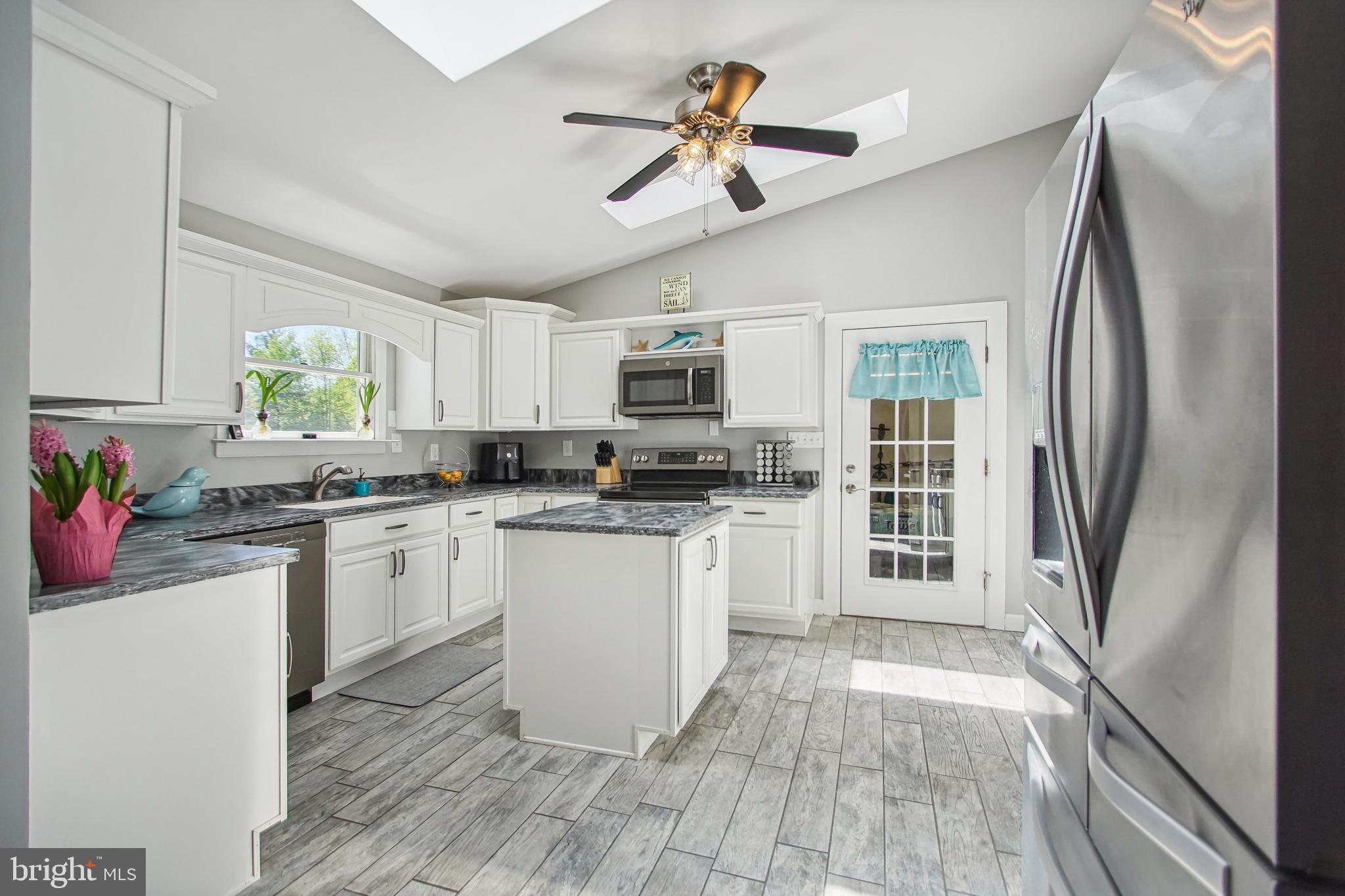 8675 Rue Court Owings, MD 20736 - Photo 20 of 50 Kitchen with access to garage