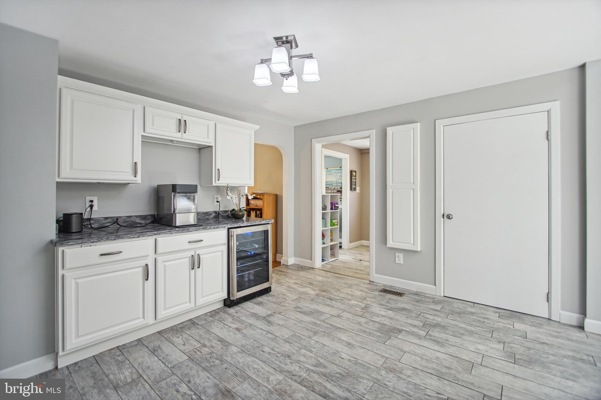 8675 Rue Court Owings, MD 20736 - Photo 23 of 50 eat in area/ laundry room and mud room