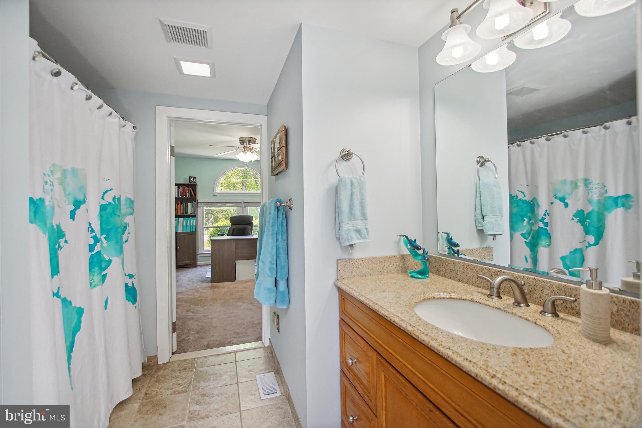 8675 Rue Court Owings, MD 20736 - Photo 31 of 50 First level full bath 3