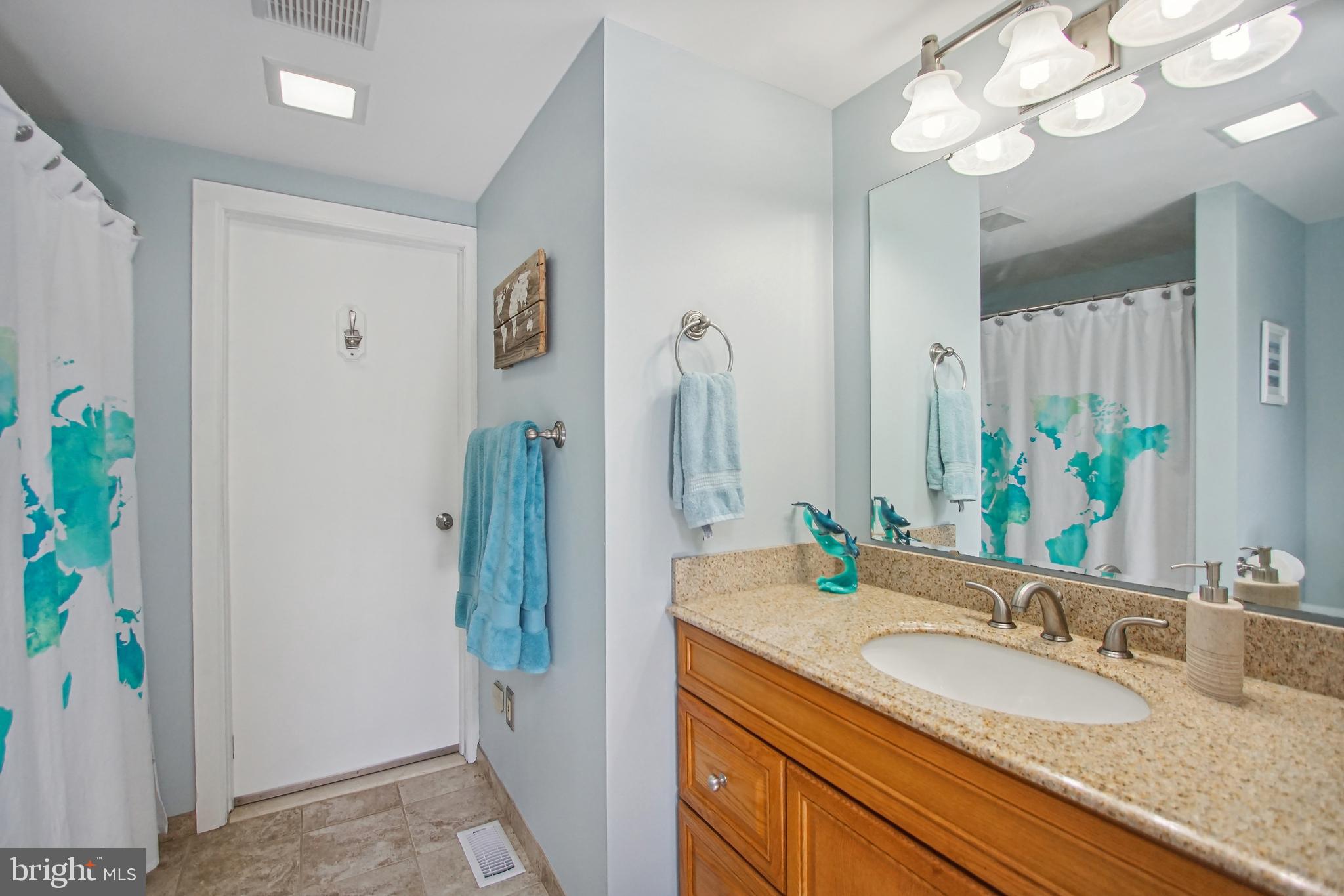 8675 Rue Court Owings, MD 20736 - Photo 32 of 50 First level full bath 3