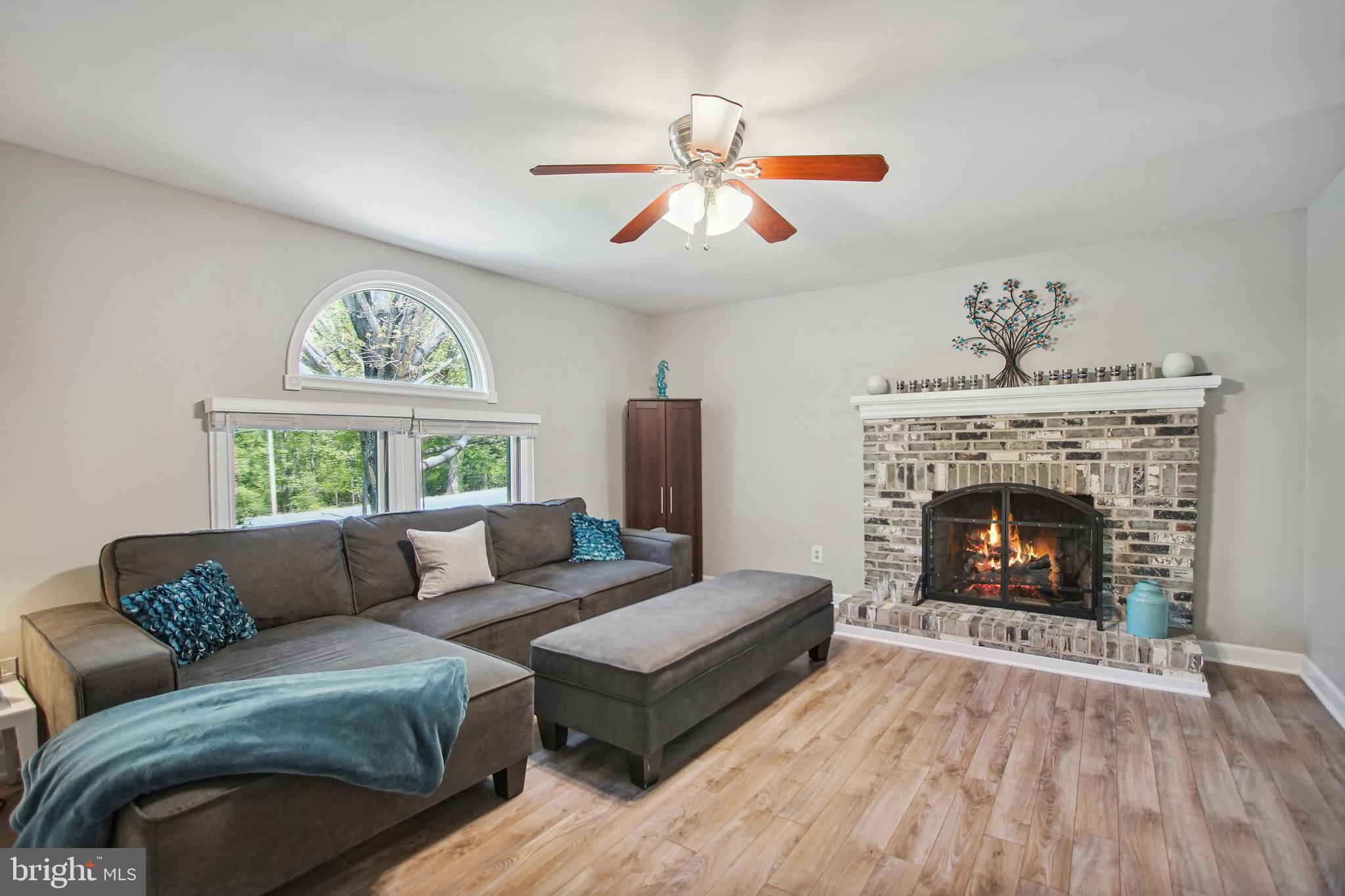 8675 Rue Court Owings, MD 20736 - Photo 10 of 50 Family Room w/gas fireplace