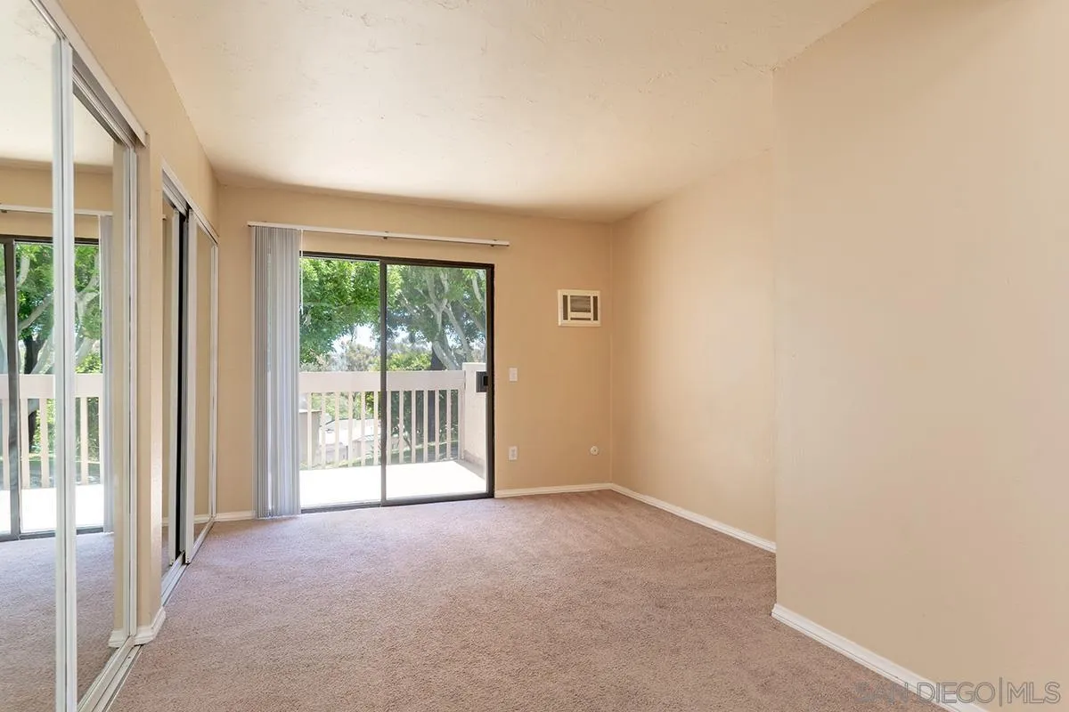 705 Copper Drive Vista, CA 92083 - Photo 15 of 31 a view of a livingroom with an outdoor space and balcony