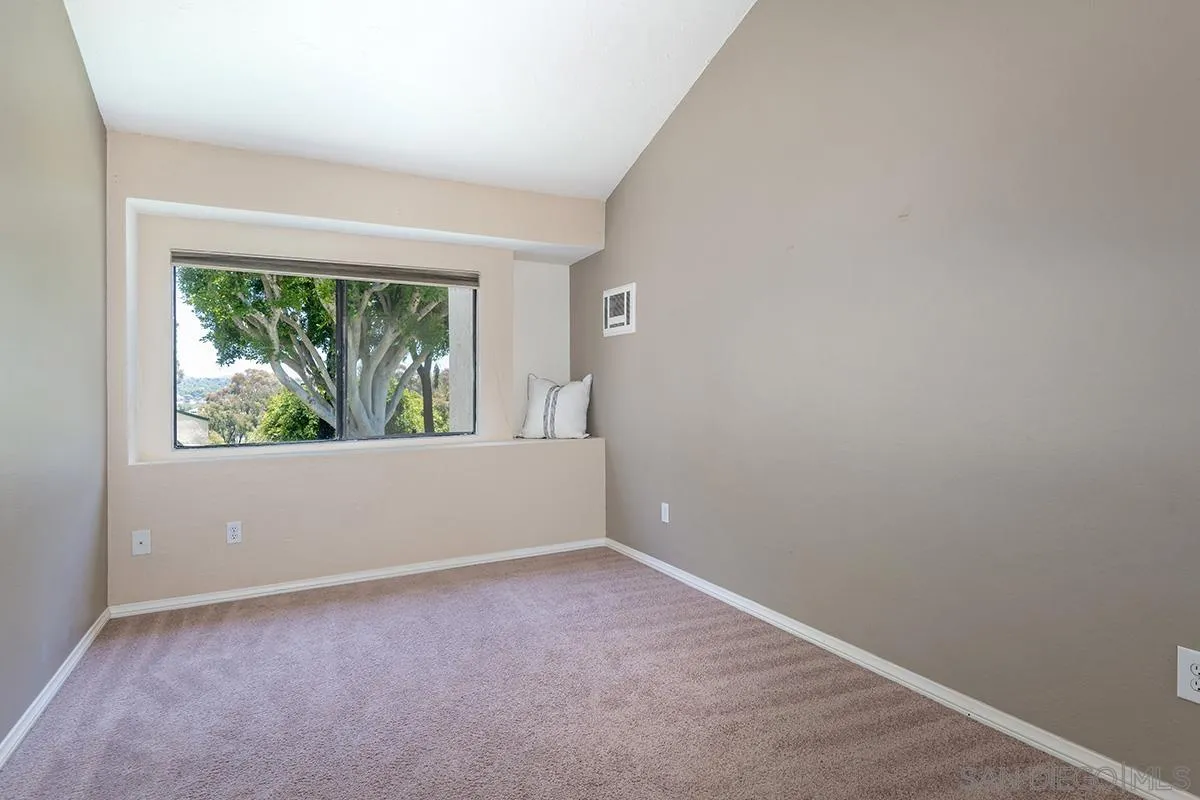705 Copper Drive Vista, CA 92083 - Photo 19 of 31 an empty room with large window