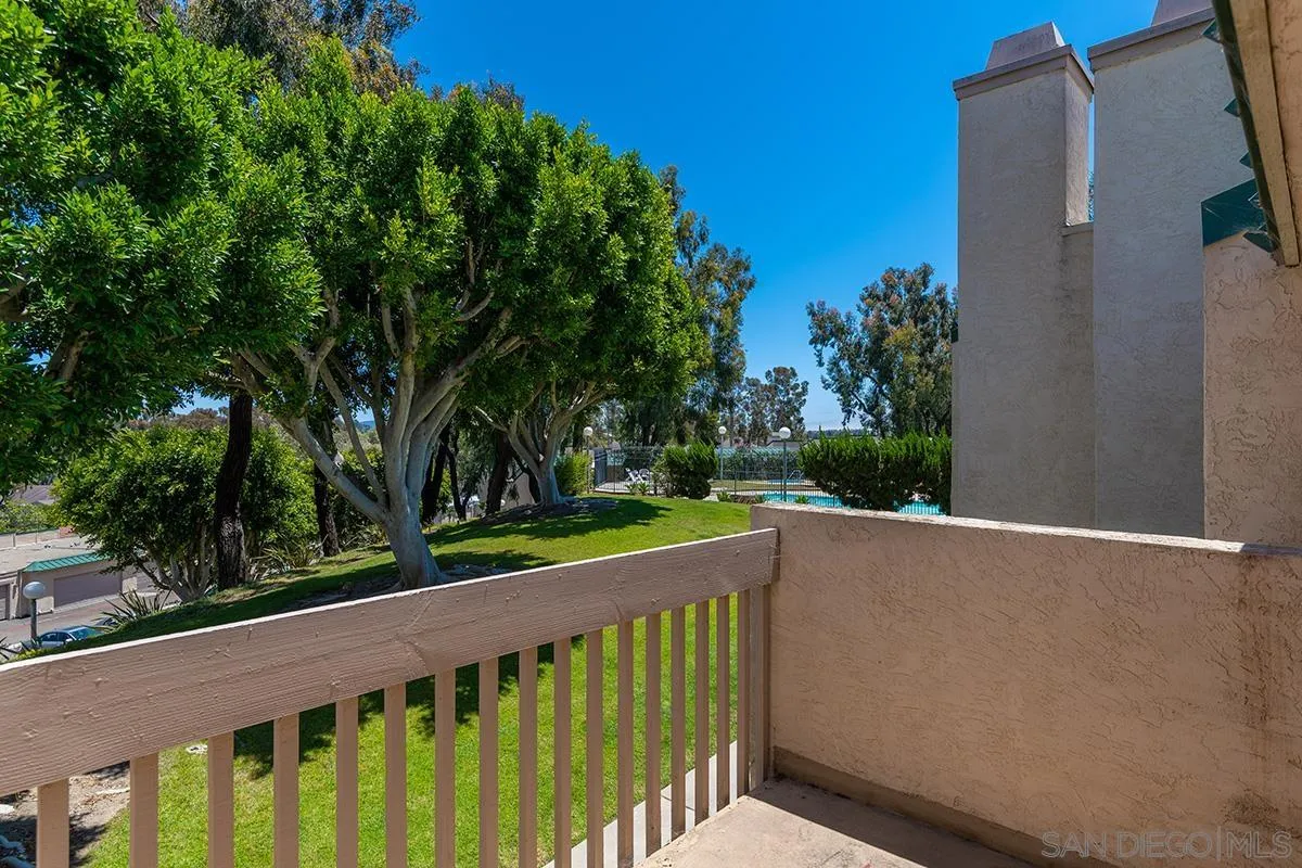 705 Copper Drive Vista, CA 92083 - Photo 22 of 31 a balcony with trees in front of it