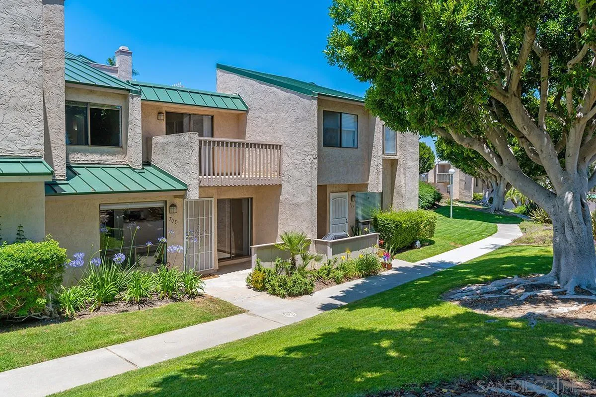 705 Copper Drive Vista, CA 92083 - Photo 24 of 31 a front view of a house with a yard