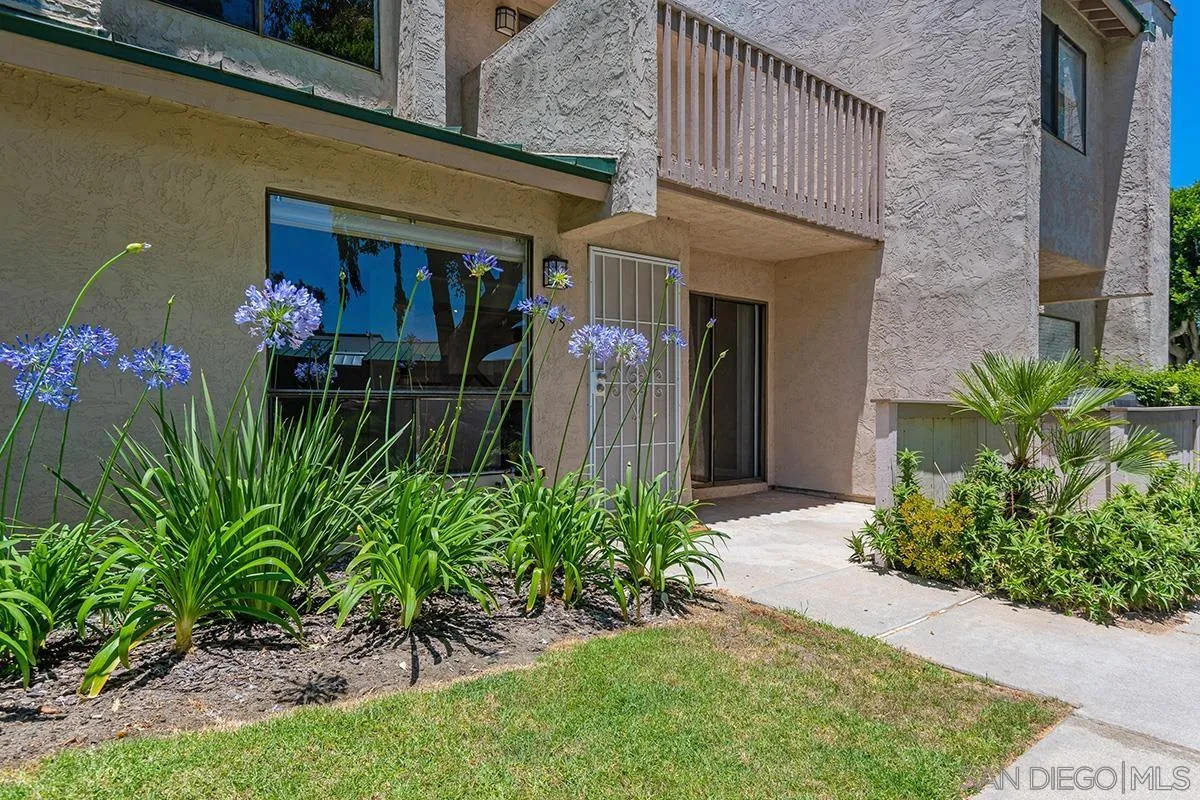 705 Copper Drive Vista, CA 92083 - Photo 25 of 31 a front view of a house with a yard