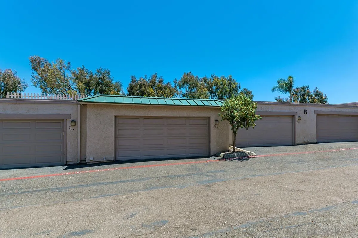 705 Copper Drive Vista, CA 92083 - Photo 29 of 31 front view of a house with a yard